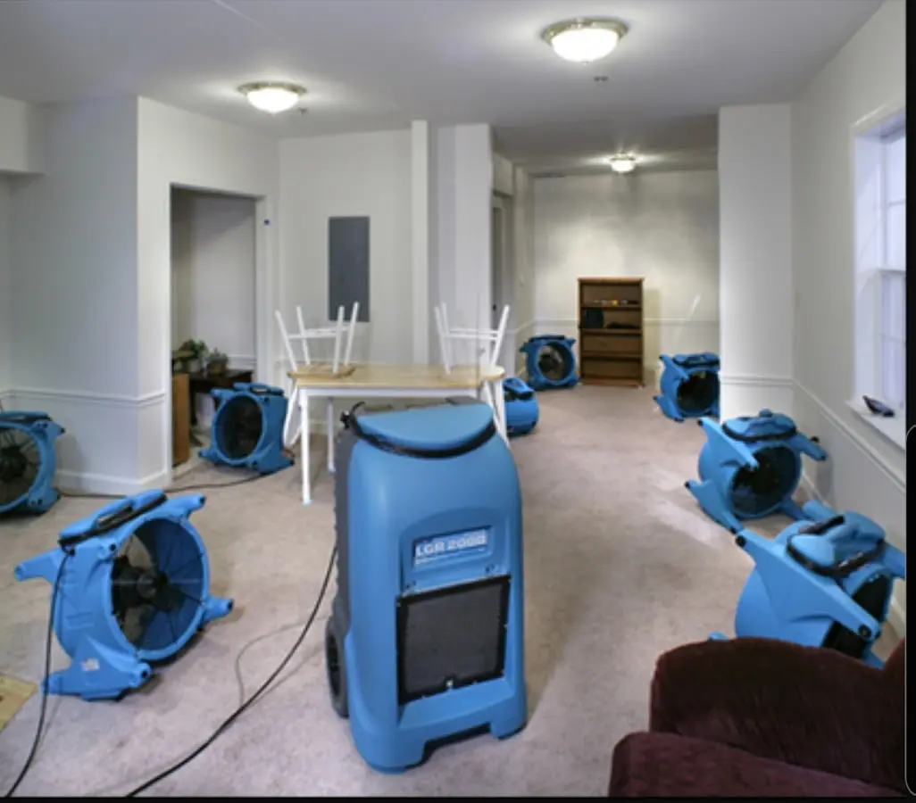 Air movers and dehumidifier setup for Water Damage Restoration in New Freedom